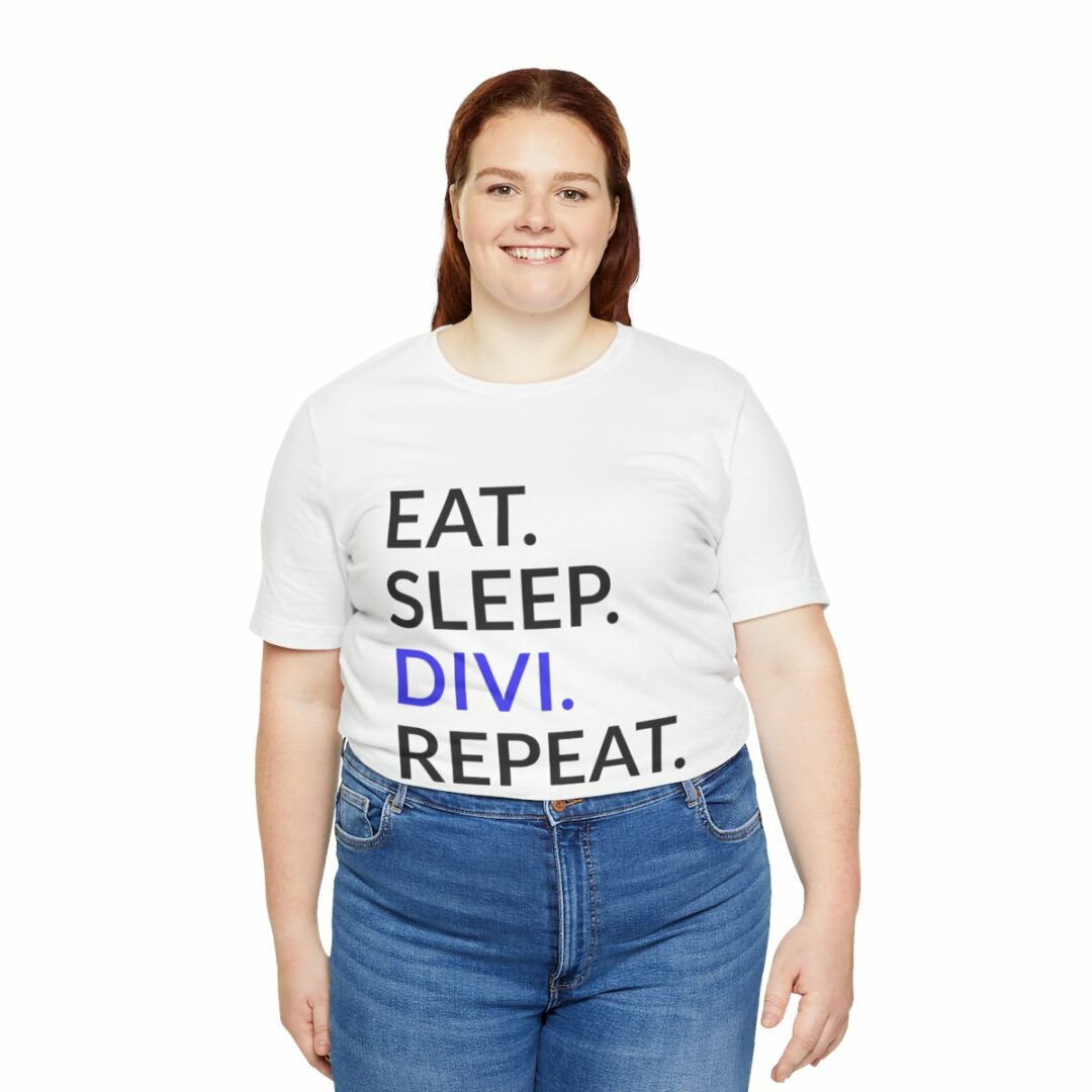 Woman in white 'EAT. SLEEP. DIVI. REPEAT.' slogan t-shirt.