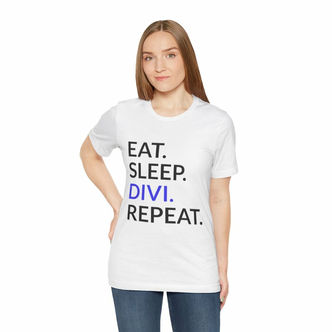 Woman in white 'Eat. Sleep. Divi. Repeat.' slogan T-shirt.