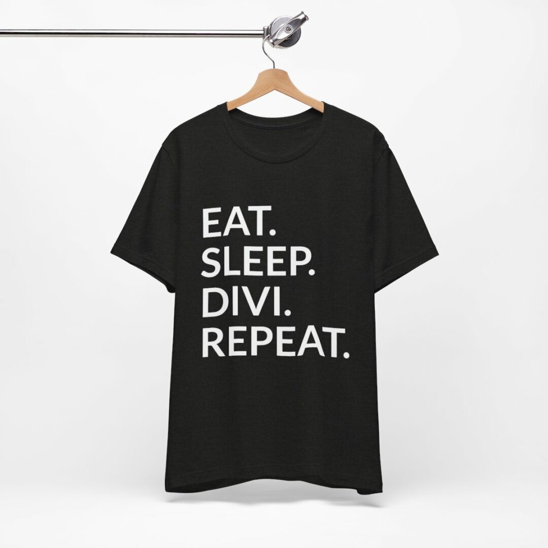 Black t-shirt with motivational white text on hanger.