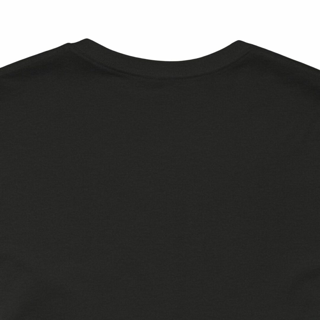 Plain black t-shirt top view.