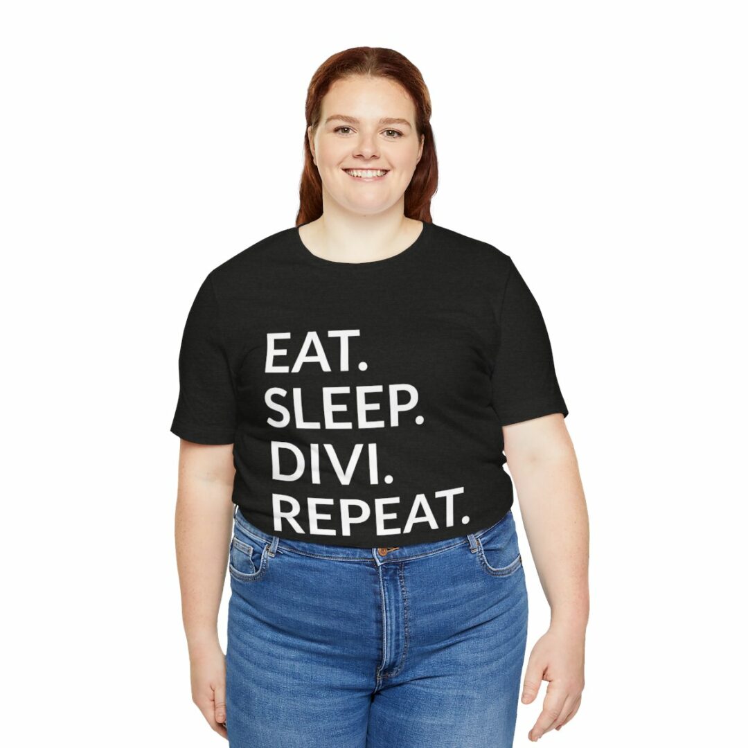 Woman in black 'EAT. SLEEP. DIVI. REPEAT.' t-shirt.