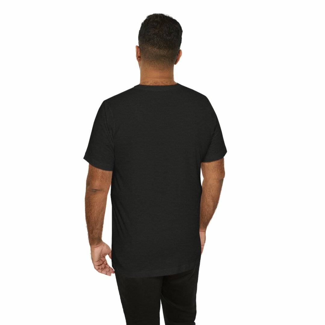 Man in black t-shirt, rear view.