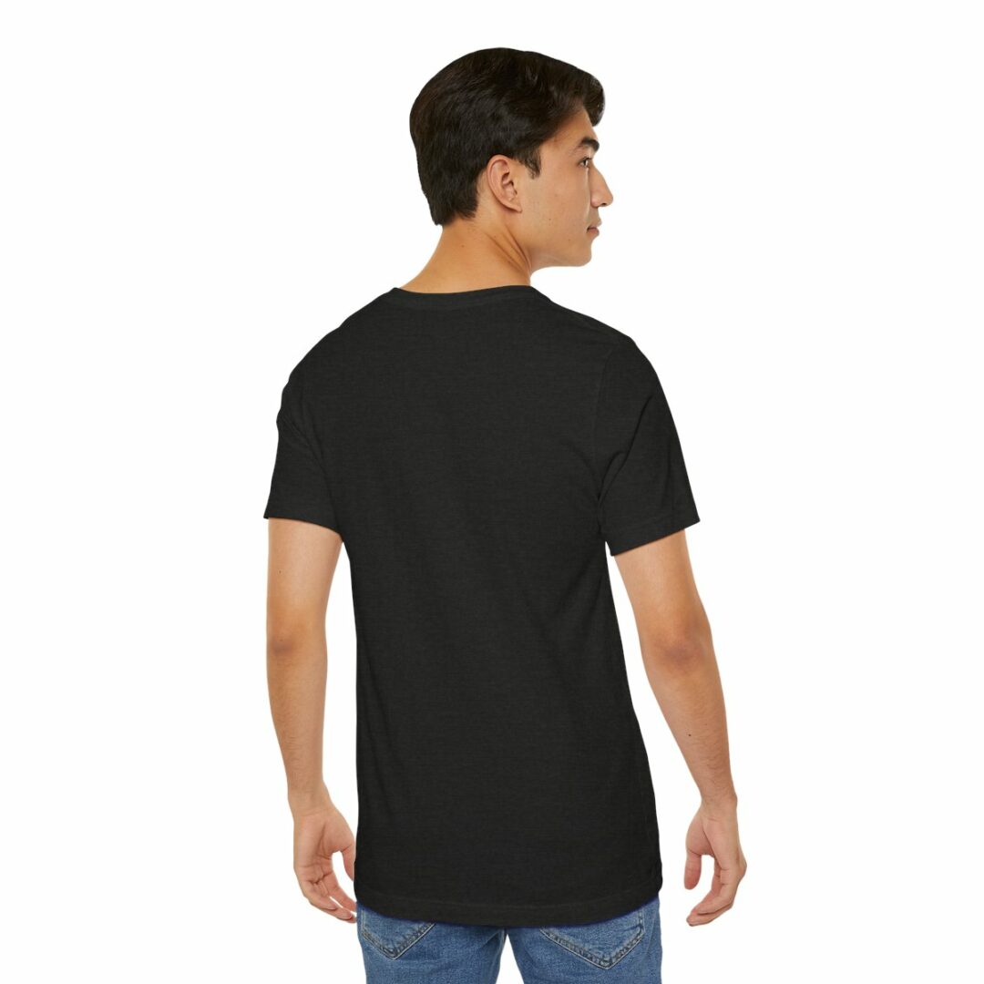 Man wearing plain black t-shirt, rear view.