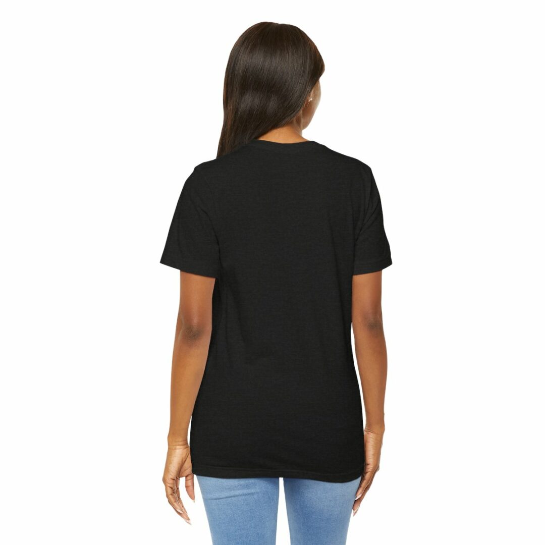 Woman in black t-shirt, rear view.