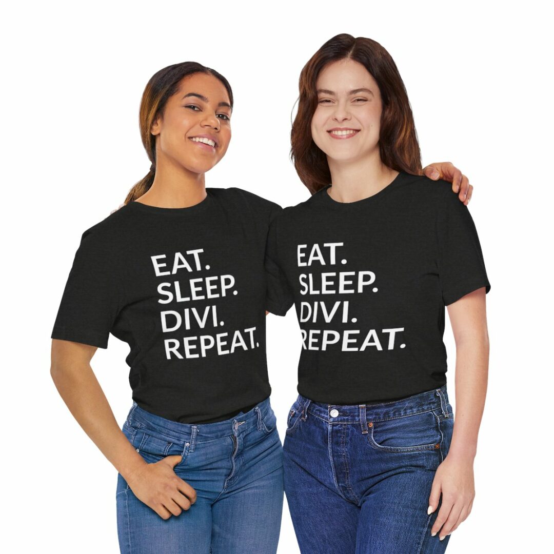 Two women wearing slogan t-shirts smiling.